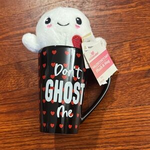 Black Mug with Heart Pattern and Plush Ghost